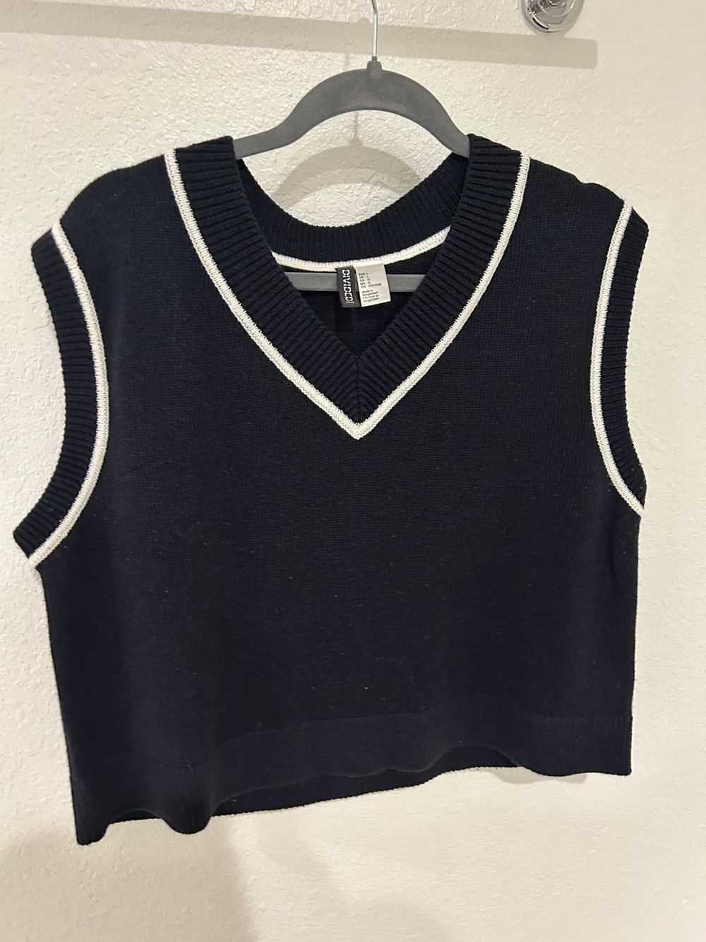 Blue Sleeveless V-Neck Sweater Vest with White Trim